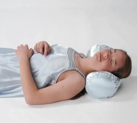 Alex Orthopedic - 1001 - Alex Orthopedic Soft Cervical Pillow, 7" diameter x 17" length, fiber filled, white fabric cover.